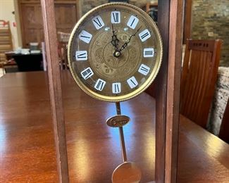 Quartz Glass Face Pendulum Clock	18 x 9.5 x 3in	
