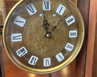 Quartz Glass Face Pendulum Clock	18 x 9.5 x 3in	
