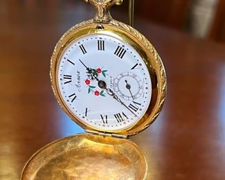 Gold Plated ARNEX Pocket Watch in Display Case 17 Jewel Caliber	Case: 7.5 inches high.	
