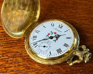 Gold Plated ARNEX Pocket Watch in Display Case 17 Jewel Caliber	Case: 7.5 inches high.	
