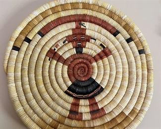 Hopi Second Mesa Coil Basket with Mudhead Design&nbsp; Native American Figural Flat Plaque	12 inches diameter	
