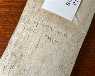 The Shaman Sings Carved Whalebone Fossil Bobby Nashookpuk	1,14.5 inches long.	
