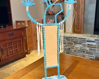 Metal & Hide Kokopelli Sculpture 	23 x 11 x 3in	HxWxD
