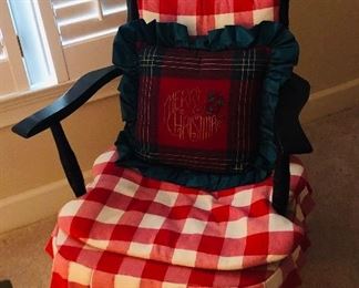 Pair of chairs painted black with cushions