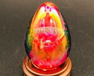 Mrs. Chorn has a large collection of paperweights. Iridescent egg