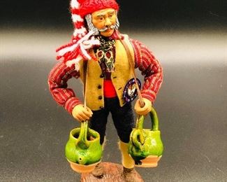 French man carrying 2 terracotta jugs, Provence France