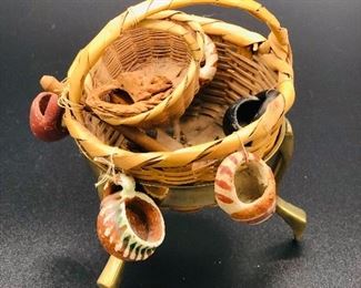 French terracotta jugs and basket on brass display stand, Provence France