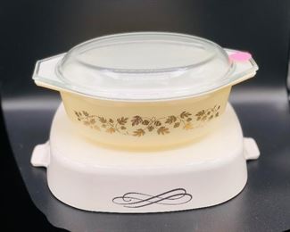 Vintage Pyrex gold leaf acorn casserole dish with lid.
Corning ware casserole black scroll