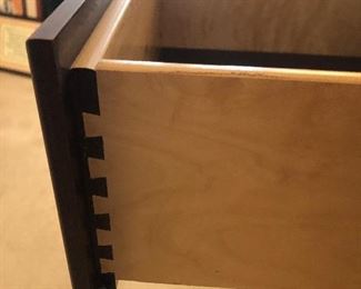 Dovetailed drawers of hutch. Also has a lined silverware drawer