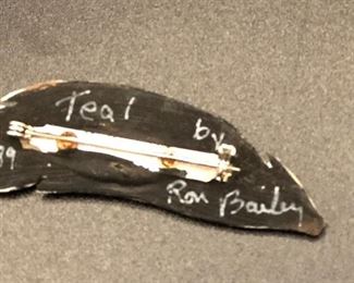 Hand carved and painted feather pin
Teal by Ron Baily 1989 Back