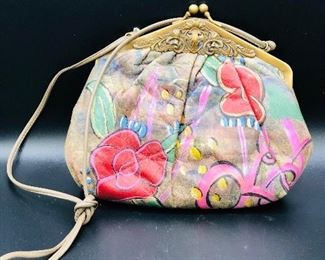 Lots of nice purses including This leather hand painted one
Also SAK purses