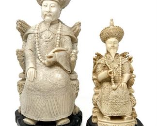 Two Carved Faux-Ivory Chinese Seated Emporer Statues