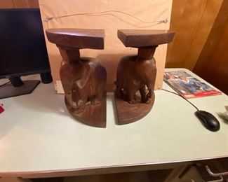 2 of 4 elephants  that together make a small table