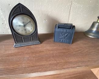 Key wind steeple clock, cast iron  & brass