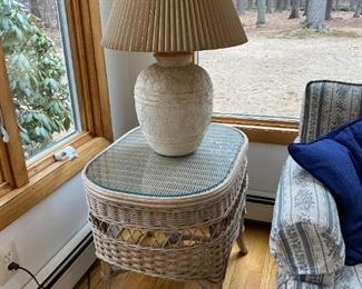 Glass topped wicker side table 