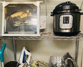New small appliances like this Showtime Rotisserie, Rowena iron and a large Instapot, 