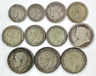 Late 19th Century and Early 20th Century Silver British 3 Pence, 6 Pence, and Shillings - The two Queen Victoria coins are an 1884 6 pence and 1894 1 Shilling struck in 3.01g and 5.66g of .925 silver respectively. The two 3 pence pieces are 1934 and 1935 examples struck in 1.41g of .500 silver. The three other 6 pence pieces are 1928, 1930, and 1938 examples struck in 2.83g of .500 silver. The three other shillings are 1922, 1929, and 1940 examples struck in 5.66g of .500 silver. 