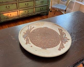 many decorative plates/platters