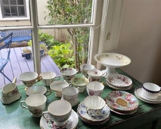 many sweet tea saucers and cups