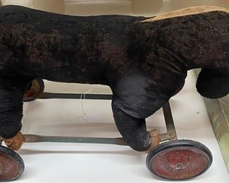 Early Plush Riding Toy with Metal Base and Wheels