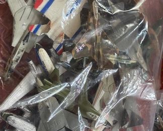 Three Bags of Small Metal Airplanes