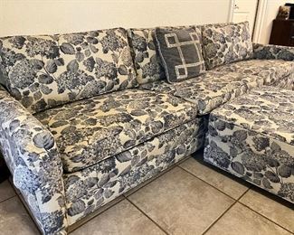 Extra-long mid-century sofa with blue floral upholstery, in very good condition