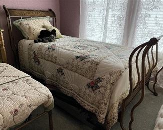 pair of twin metal sleigh beds
