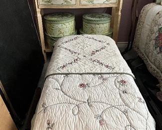 small bench with quilt