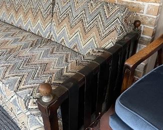 curved mid-century sofa with zig-zag upholstery