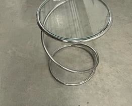 $450 USD     Leon Rosen for Pace Spiral Chrome and Glass Mid Century Side End Table PA107-25      Description: Vintage midcentury Leon Rosen for Pace Collection designed "Spring" chrome and glass side, end or drinks table in very nice condition. Chrome is bright, glass may have a few light scratches. Nice example.

DIMENSIONS: 13 x 13 x18H

LOCATION: Local pick up NE Washington, D.C.  Contact us for shipper suggestions.

CONDITION: Used. Table is in very good condition with only minor signs of wear commensurate of age and use.      https://goodbyhello.com/products/spiral-metal-glass-top-end-table-pa107-25?_pos=10&_sid=7ea65b4aa&_ss=r