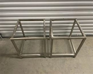 $525 USD     Pair of Brushed Stainless Steel framed Glass Top Cube Frame End Tables PA107-24     DESCRIPTION: This circa 1950s or 1960s set of two cube tables have open frame iron bases and glass tops. They can be used together as a coffee or cocktail table, separately as side tables or chair side drink stands, or as platforms for display or plants, or stack them!

DIMENSIONS: 18 x 18 x 21.5H

LOCATION: Local pick up NE Washington, D.C.  Contact us for shipper suggestions.

CONDITION: Used

Tables are in good vintage condition with minor signs of wear consistent with use and age. Please refer to photo's for details.       https://goodbyhello.com/products/pair-of-heavy-metal-glass-top-end-tables-pa107-24?_pos=9&_sid=7ea65b4aa&_ss=r