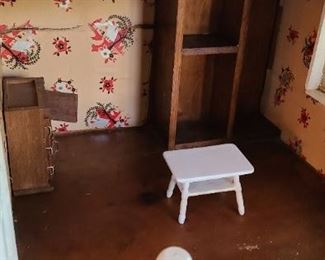 Close up of a Dollhouse built by Mrs. Jennings Grandfather in 1922.