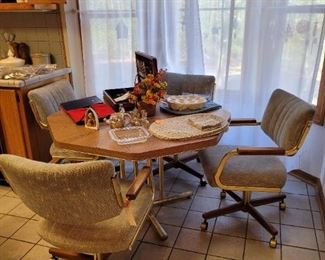 dining table & 4 chairs on rollers