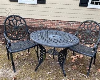 Antique cast iron bistro set. Good grief it is heavy - this beauty is not going anywhere in a wind storm.