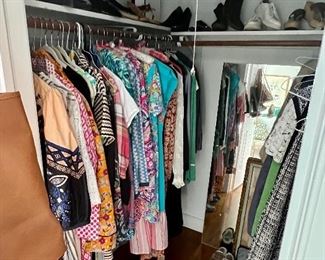 Closets are filled with designer clothing and shoes! 