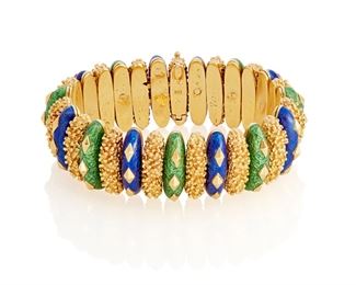 5
An Enamel Bracelet
18k yellow gold; Stamped: 18k
Designed with alternating links of textured gold, blue enamel and green enamel
182.9 grams
6.5" L x 0.875" W
Estimate: $6,000 - $8,000
