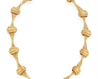 18
A Henry Dunay Necklace
18k yellow gold; Stamped: Dunay / 18k / 750 / Maker's mark
Designed as twisted gold wire alternating with scalloped terminals with a textured finish
100.1 grams
15.0" L x 0.625" W
Estimate: $5,000 - $7,000