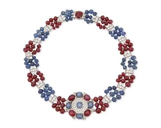 21
A Sapphire, Ruby And Diamond Necklace
Platinum
A triple strand necklace set with alternating sapphire and ruby beads each gauged at approximately 5.5mm-7.5mm further set with one hundred forty-three round antique and modern full and single-cut diamonds totaling approximately 13.50cts. in weight and graded H-I color and SI clarity and accented with four oval cabochon star rubies and five oval cabochon star sapphires each gauged at approximately 9mm x 7.5mm and finished with a large oval cabochon ruby on the clasp gauged at 12mm x 10mm
111.5 grams
17.0" L x 1.50" W
Estimate: $7,000 - $9,000