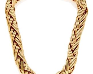 31
A German Gold Necklace
18k yellow gold; Stamped: 18k / Germany / AZ
Of a circular braided design
255.0 grams
17.75" L x 0.625" W
Estimate: $6,000 - $8,000