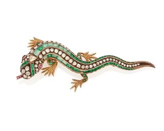 50
An Emerald And Diamond Lizard Brooch
Silver-topped 18k yellow gold; Scratched: 1532
Set with eighty-eight calibre-cut and round mixed-cut emeralds graduating in size and further set with sixty-nine rose-cut diamonds gauged from 3.5mm -1.7mm in diameter and one fancy step-cut diamond gauged at 4mm in diameter (widest point) and accented with four round mixed-cut emeralds
20.6 grams
3.75" W x 1.125" H
Estimate: $2,000 - $3,000