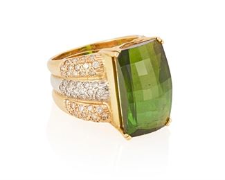 58
A Green Tourmaline And Diamond Ring
18k yellow and white gold
Centering a rectangular fancy-cut green tourmaline gauged at 19mm x 11.50mm x 9mm further accented with three rows of eighty-eight pave set round full-cut diamonds totaling approximately 1.00ct. in weight and graded H-I color and SI clarity
Ring size: 8
16.5 grams
0.75" H
Estimate: $600 - $800