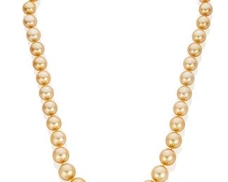 60
A Golden South Sea Cultured Pearl Necklace
18k yellow gold; Stamped: 750 / TGI
With cultured pearls graduating in size from approximately 10.0mm to 13.3mm and completed by an 18k yellow gold ball clasp set with ten round full-cut diamonds totaling approximately 0.25ct. in weight and graded G-H color and VS clarity
81.2 grams
20.0" L
Estimate: $1,500 - $2,000
