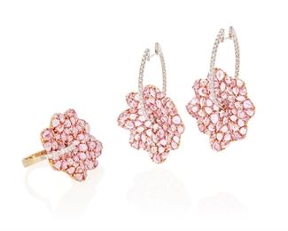 61
A Set Of Pink Sapphire And Diamond Foliate Jewelry
18k white and rose gold; Each stamped: 18k / 750 / 56
A matching set of jewelry including a pair of flower hoop earrings set with pear and marquise shaped rose-cut pink sapphires further set with ninety-eight round full-cut diamonds totaling approximately 3.75cts. in weight and each graded G-H color and VS/SI clarity together with a matching ring set with pear and marquise rose-cut pink sapphires accented with twenty-one round full-cut diamonds totaling approximately 0.35ct. in weight and graded G-H color and VS/SI clarity
Ring size: 8.25
34.0 grams
3 pieces
Earrings: 1.25" W x 1.75" H; Ring: 1.25" W x 1.125" H
Estimate: $2,000 - $3,000