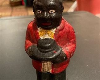 Antique Painted Cast Iron Man Coin Bank.