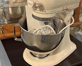White Kitchen Aid Mixer with some Accessories