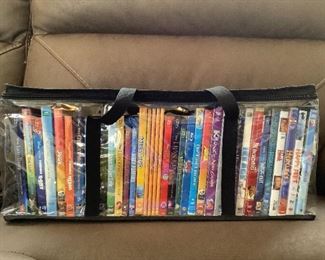 (20+) Disney DVD's and More. Several NEW and sealed in factory packaging.