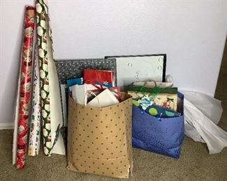 Assortment of Wrapping Paper and Gift Bags, White Board, Cutting Grid, Basket, Tree Stand and more