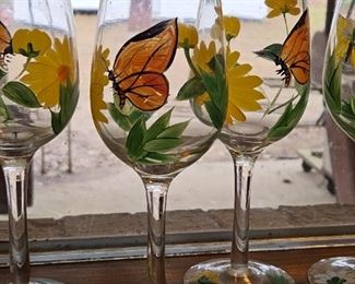 Hand painted wine glasses flowers and butterflies