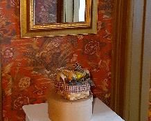 painted hamper, framed mirrors