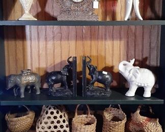 elephant collectibles, baskets, metal monkey clock